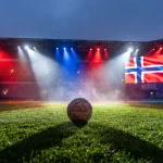 Norge på VM 2026 med Erling Haaland og Martin Ødegaard foran det norske flagget